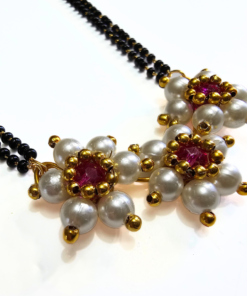 Moti Kudi short mangalsutra with white pearls and three-flower pendant, matching earrings included