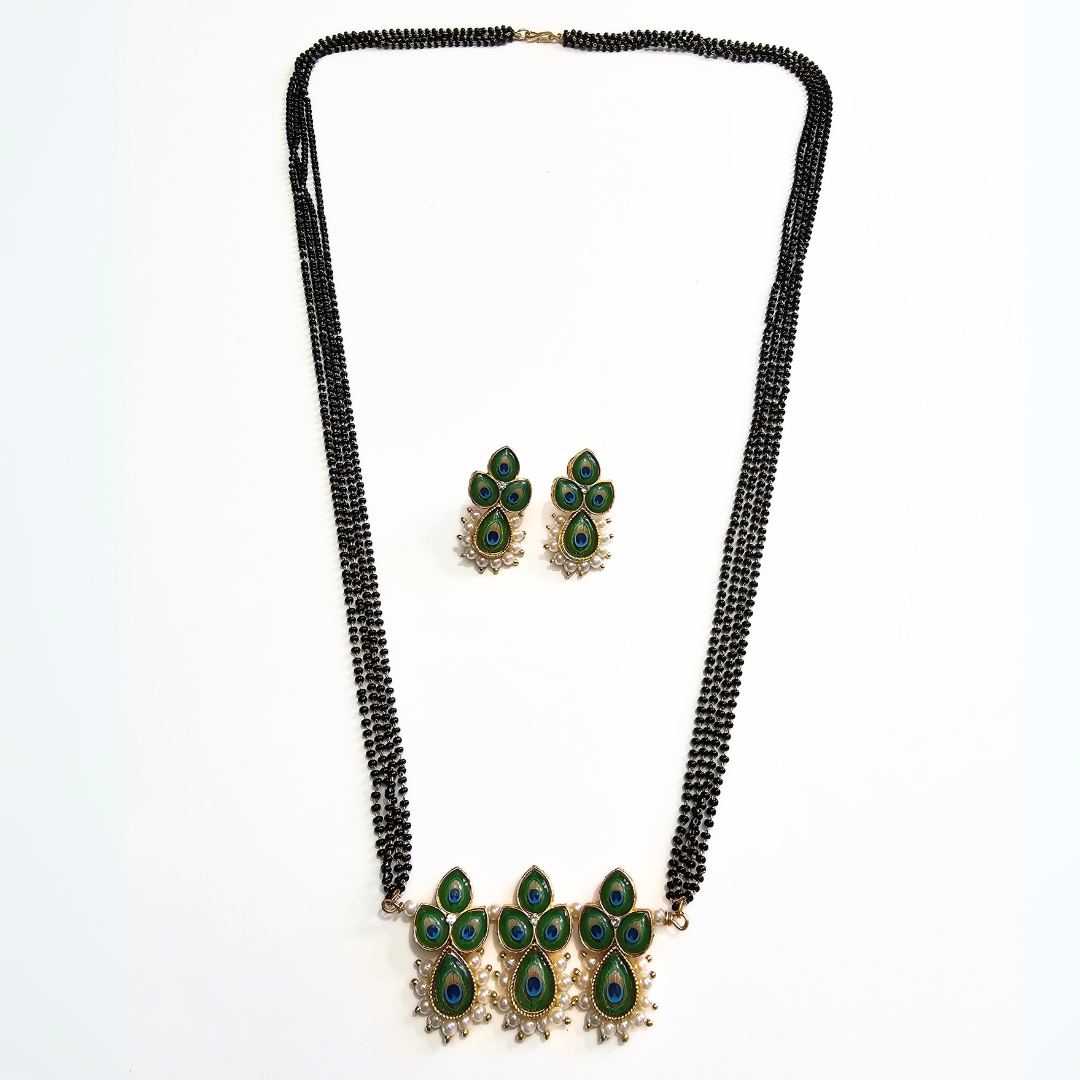 peacock design pendant with pearl border, and matching earrings