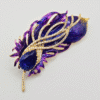 multicolored peacock feather brooch